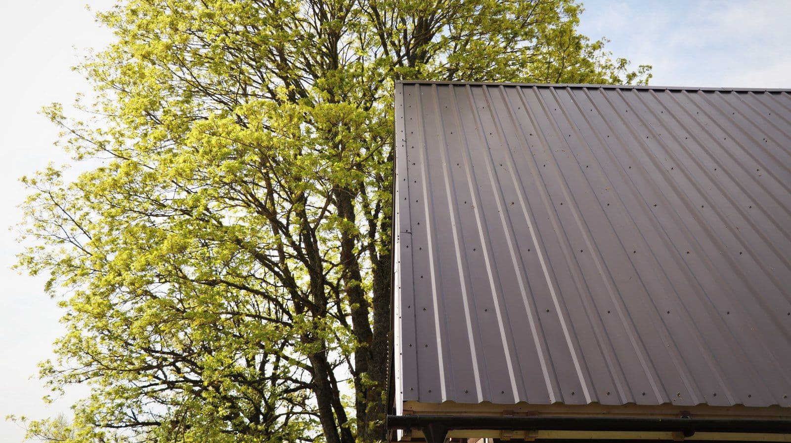 Durable and Stylish Brown Metallic Roof Installation image